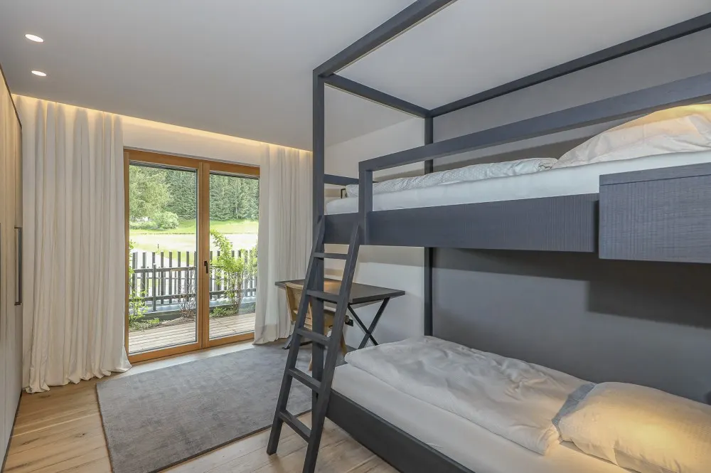 KITZIMMO-Riverside - Luxus-Garden-Suite in Toplage kaufen - Immobilien Kirchberg.