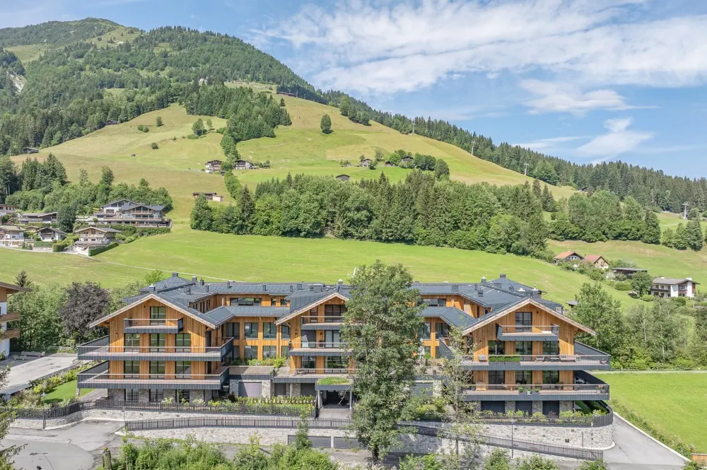 KITZIMMO-Riverside - Luxus-Garden-Suite in Toplage kaufen - Immobilien Kirchberg.