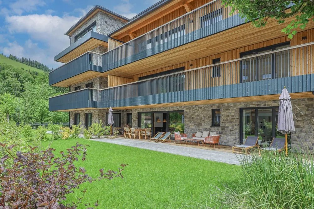 KITZIMMO-Riverside - Luxus-Garden-Suite in Toplage kaufen - Immobilien Kirchberg.