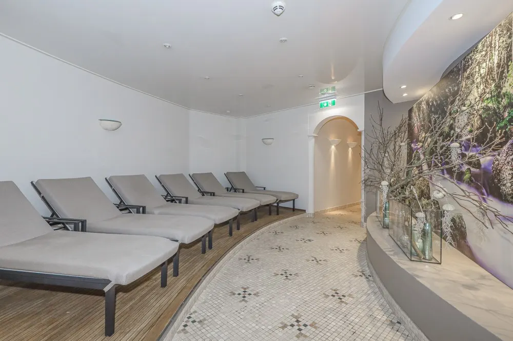 KITZIMMO-Luxus-Suite mit Zugang in ein 5-Sterne-Hotel - Immobilien Kitzbühel.