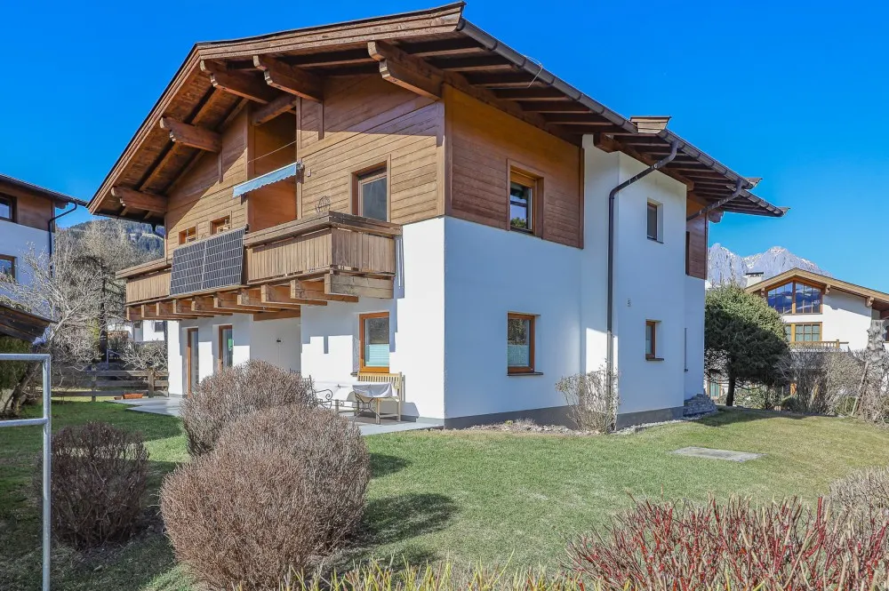 KITZIMMO-Exklusive Gartenwohnung in sonniger Ruhelage - Immobilien Reith bei Kitzbühel.