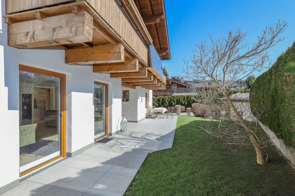 KITZIMMO-Exklusive Gartenwohnung in sonniger Ruhelage - Immobilien Reith bei Kitzbühel.