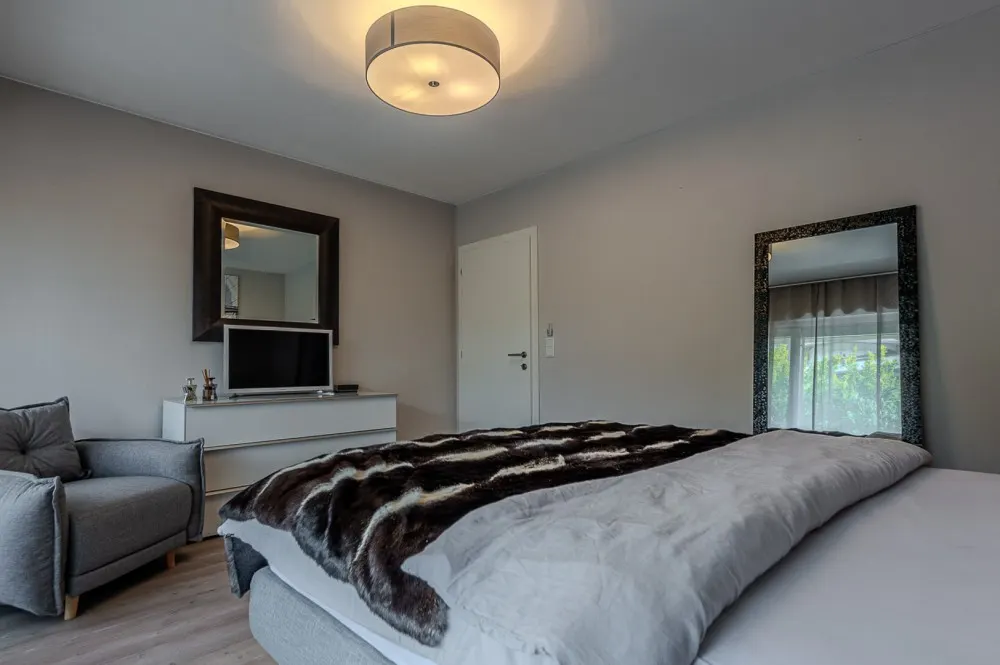 KITZIMMO-Hochwertige Haushälfte am Golfplatz kaufen - Immobilien Kitzbühel.