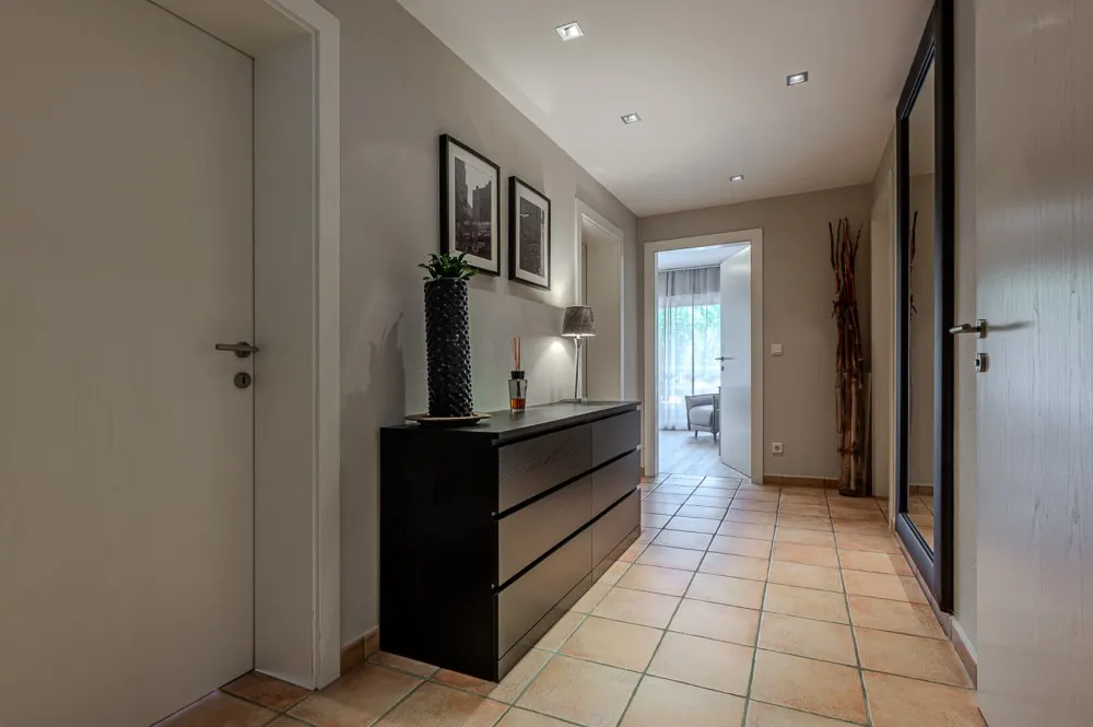 KITZIMMO-Hochwertige Haushälfte am Golfplatz kaufen - Immobilien Kitzbühel.