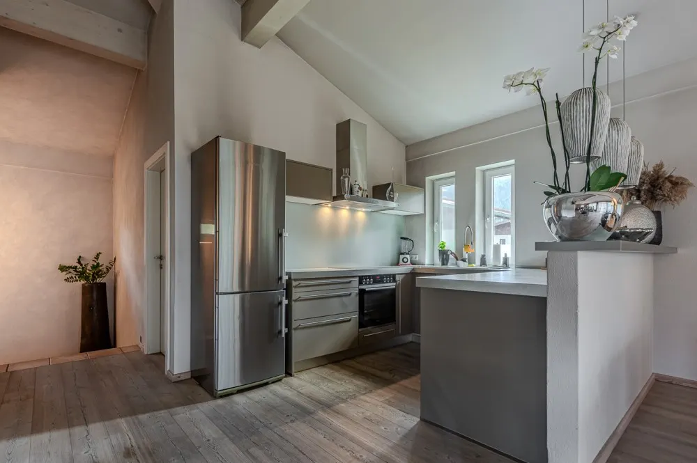 KITZIMMO-Hochwertige Haushälfte am Golfplatz kaufen - Immobilien Kitzbühel.