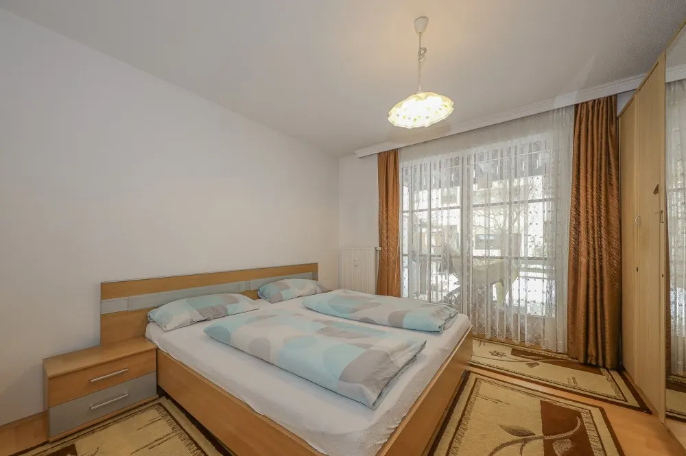 KITZIMMO-Gartenwohnung in zentraler Ruhelage kaufen - Immobilien Kirchberg.