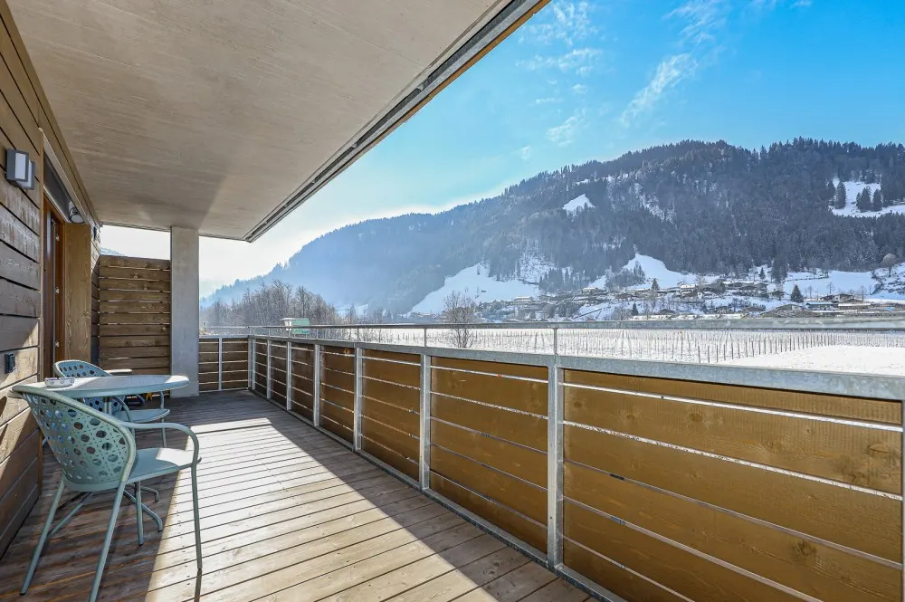 KITZIMMO-exklusive Neubauwohnung mit Hahnenkammblick - Immobilien Kitzbühel.-8