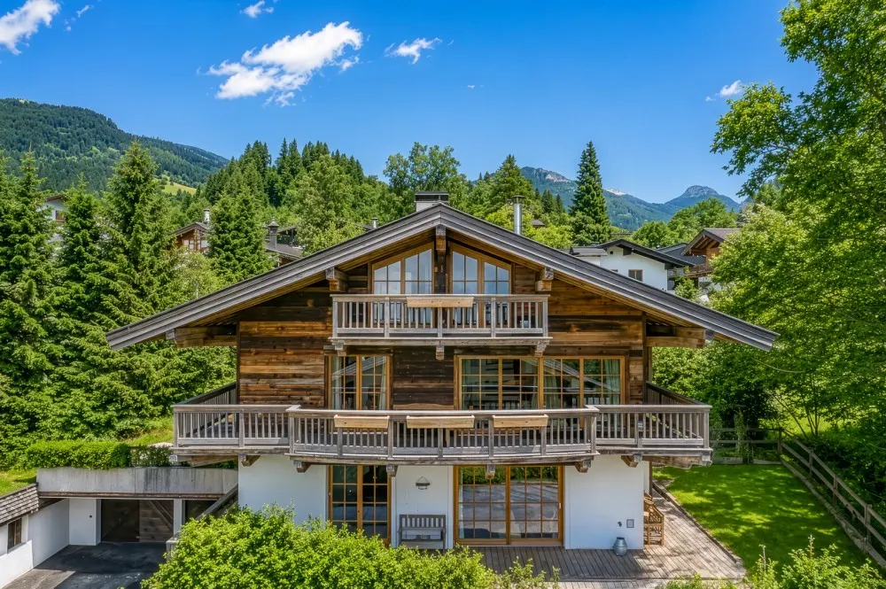KITZIMMO-Exklusive Gartenwohnung in Top-Ruhelage auf der Bichlalm - Immobilien Kitzbühel.