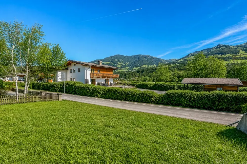 KITZIMMO-Grundstück mit Baugenehmigung für 3-Luxuswohnungen - Immobilien Kitzbühel.-2