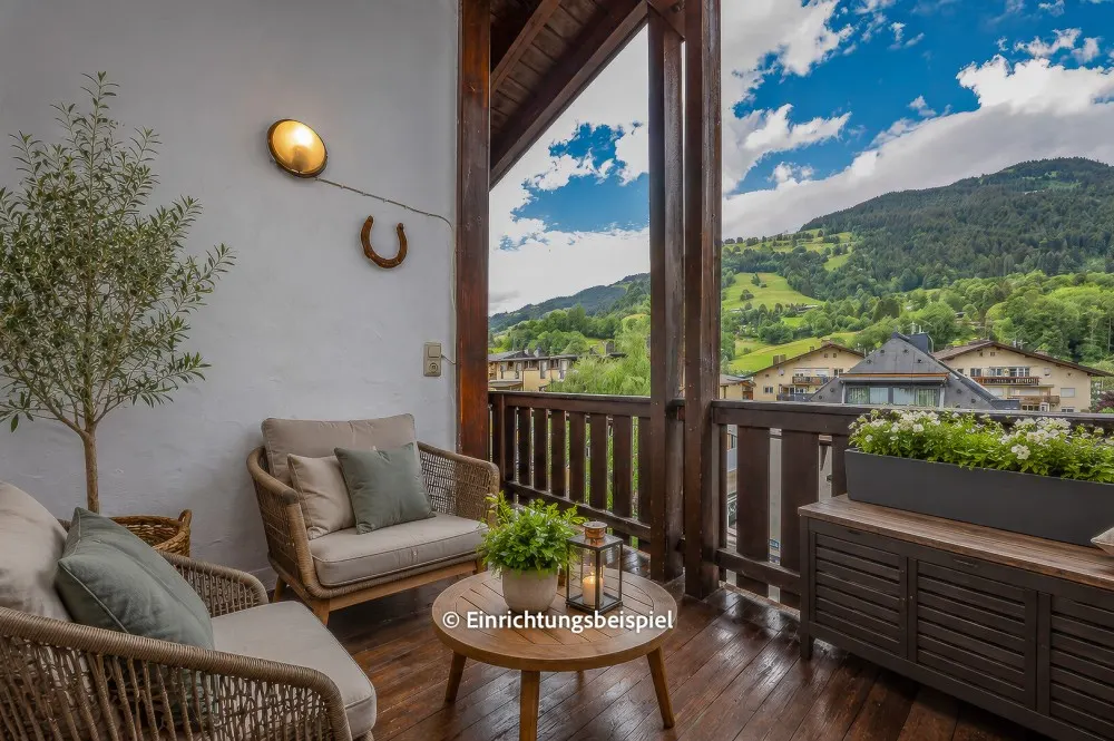 KITZIMMO-Dachgeschosswohnung mit Bergblick kaufen - Immobilien Kitzbühel.