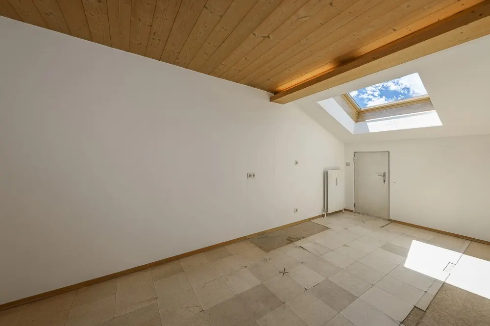KITZIMMO-Dachgeschosswohnung in Ruhelage mit Kaiserblick kaufen - Immobilien Oberndorf.