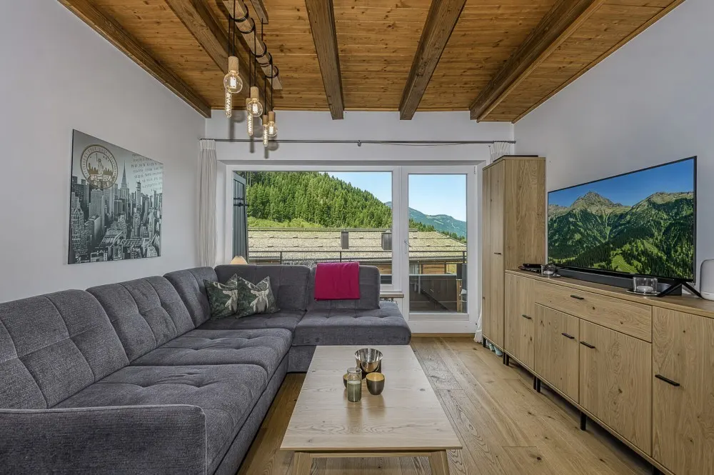 KITZIMMO-Dachgeschosswohnung an der Skipiste mit Kaiserblick kaufen - Immobilien Kitzbühel.-2