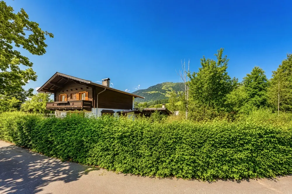 KITZIMMO-Baugrundstück mit Altbestand auf der Bichlalm kaufen - Immobilien Kitzbühel.-1-4