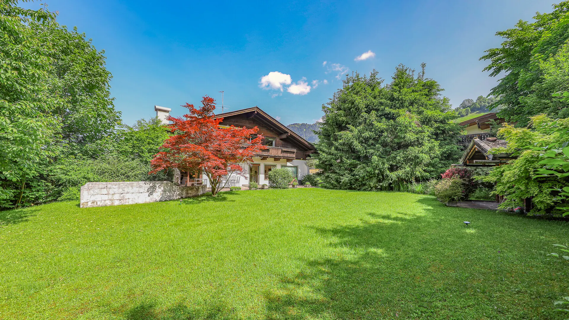 KITZIMMO-Baugrundstück mit Altbestand in Toplage auf der Bichlalm - Immobilien Kitzbühel-2