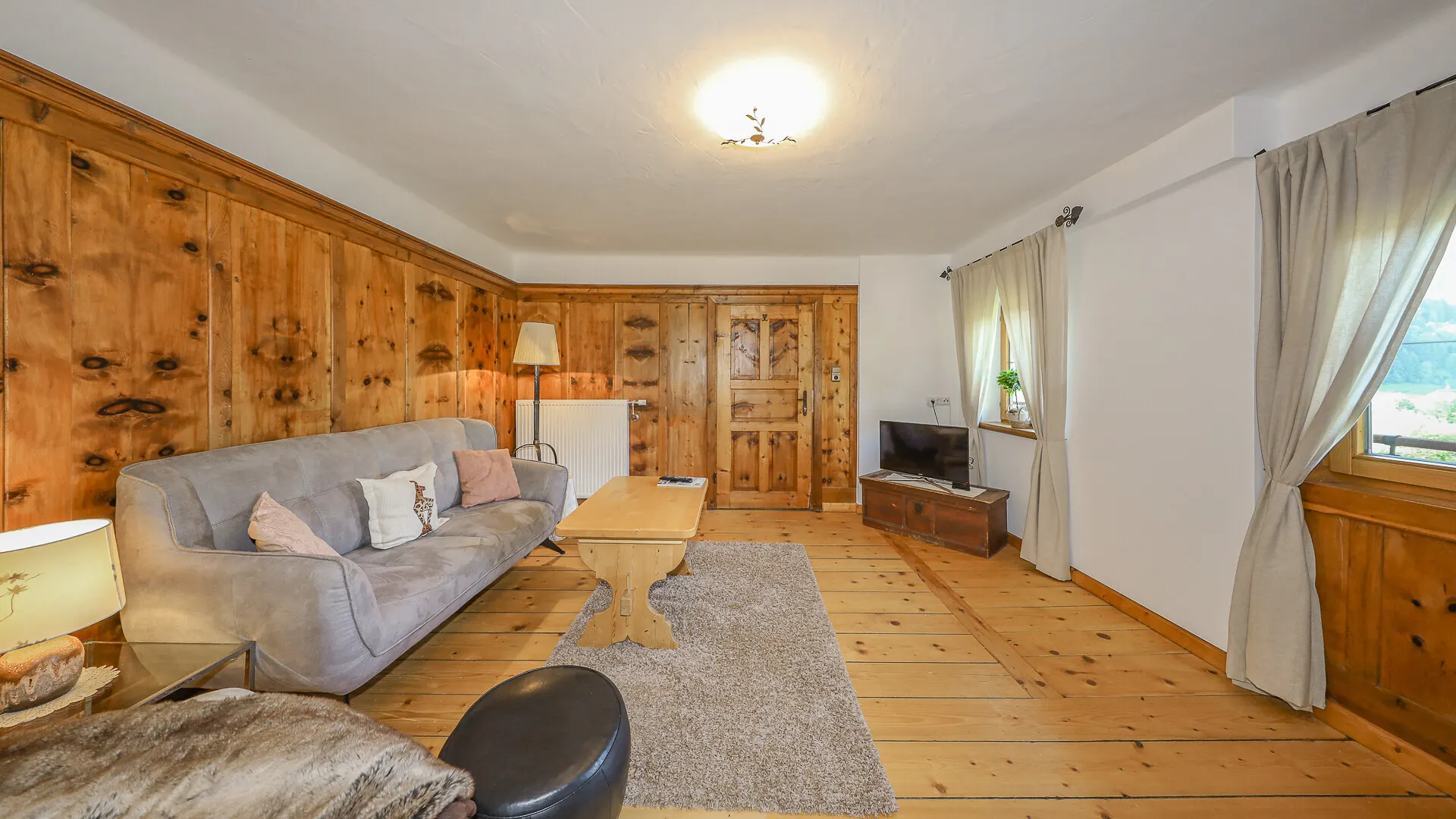 KITZIMMO-Dachgeschosswohnung im Bauernhaus mit touristischer Widmung - Immobilien Jochberg.