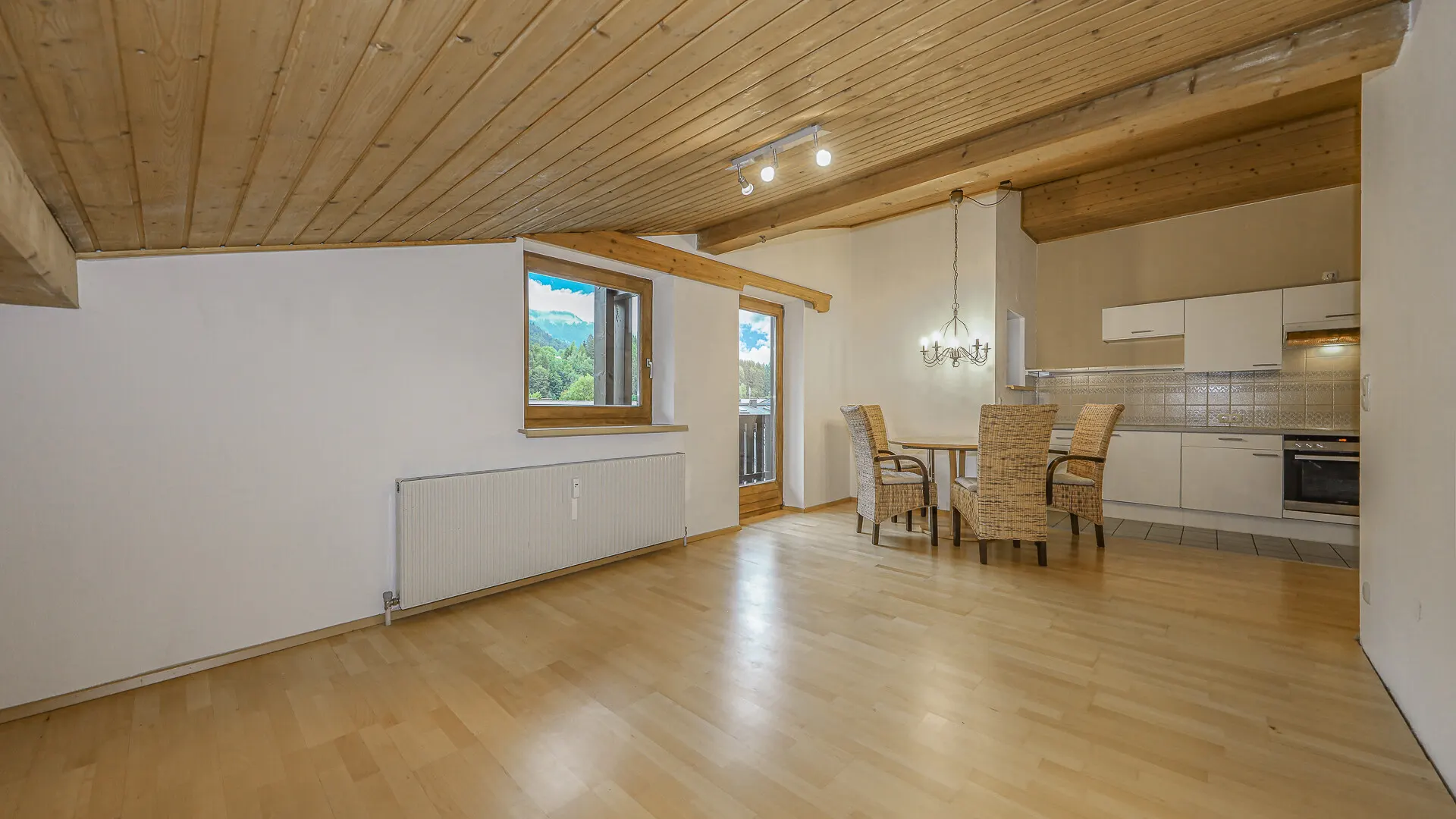 KITZIMMO-Dachgeschosswohnung mit Bergblick kaufen - Immobilien Kitzbühel.