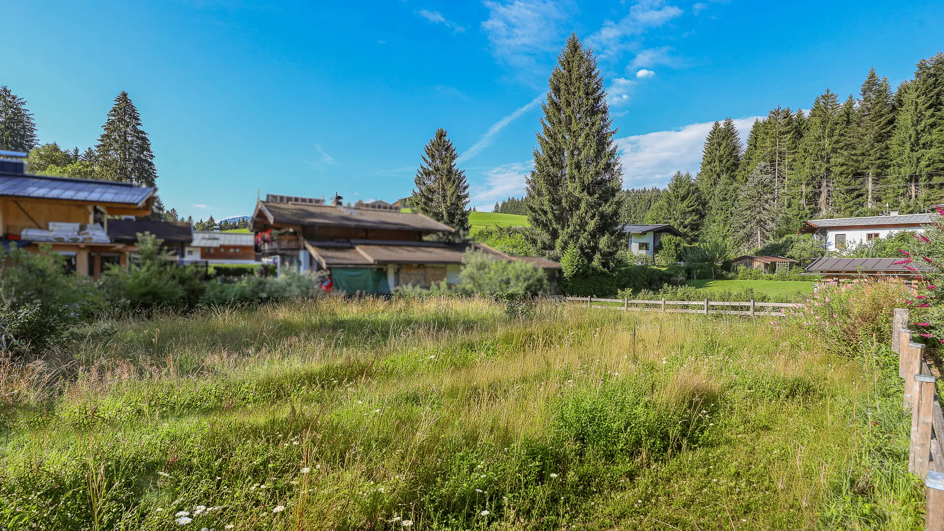 KITZIMMO-Grundstück mit Baugenehmigung für ein exklusives Chalet - Immobilien Oberndorf.